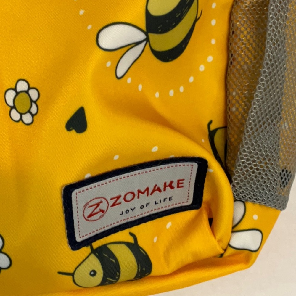 NWOT Yellow Bee Print Sling Backpack - Picture 2 of 7
